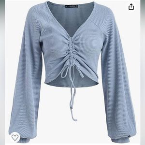 ZAFUL LIGHT BLUE WAFFLE KNIT LONG SLEEVE CROP TOP WITH TIE AND PUFF SLEEVES